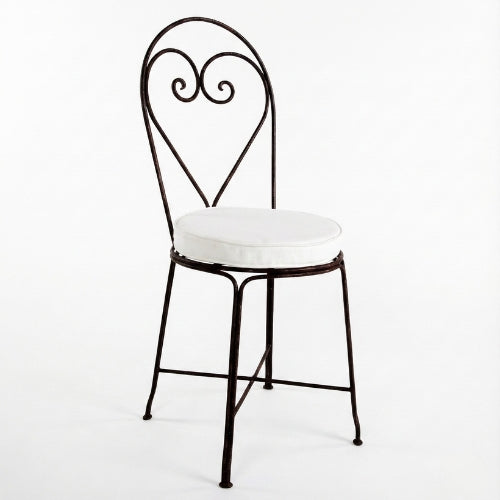 Chaise en fer forgé coeur avec coussin blanc finition rouille vernie rustol pour interieur et exterieur