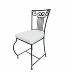 Chaise en fer forgé moustache avec coussin blanc finition rouille vernie rustol pour exterieur