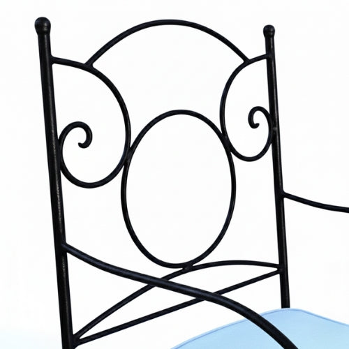 Detail du travail du fer forge artisanal sur fauteuil ideal