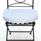 Detail du pied en fer forge de la chaise pliante ideal artisanale