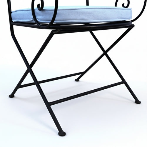 Detail du pied en fer forge du fauteuil ideal structure artisanale