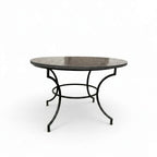 Table ronde en zellige Ø 120 cm noire – Table artisanale en béton avec pied fixe en fer forgé noir