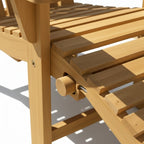 Fauteuil Adirondack en teck massif avec assise inclinée et accoudoirs larges conçu pour un usage extérieur durable