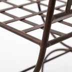 Structure en fer forgé noir du fauteuil moustache avec dossier travaillé artisanal