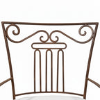 Structure en fer forgé noir du fauteuil moustache avec dossier travaillé artisanal