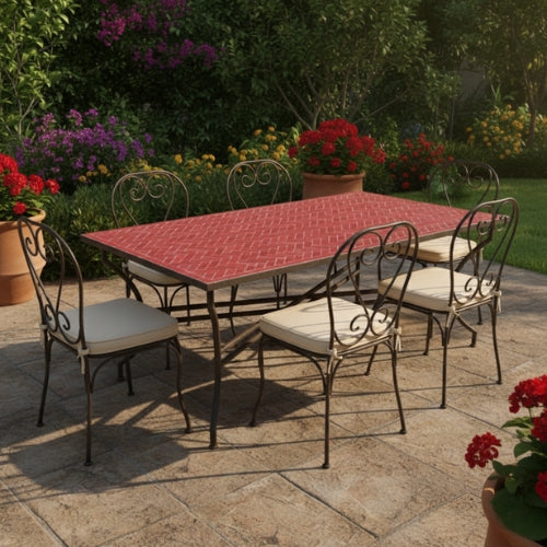 Table rectangulaire en zellige marocain bordeaux avec pied pliable en fer forgé installée sur terrasse extérieure