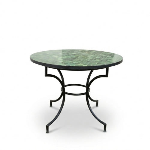 Détail du pied noir en fer forgé de la table ronde artisanale en zellige
