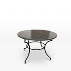 Table ronde en zellige Ø 120 cm noire – Table artisanale en béton avec pied fixe en fer forgé noir