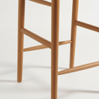 vue laterale tabouret teck massif design epure stabilite usage quotidien